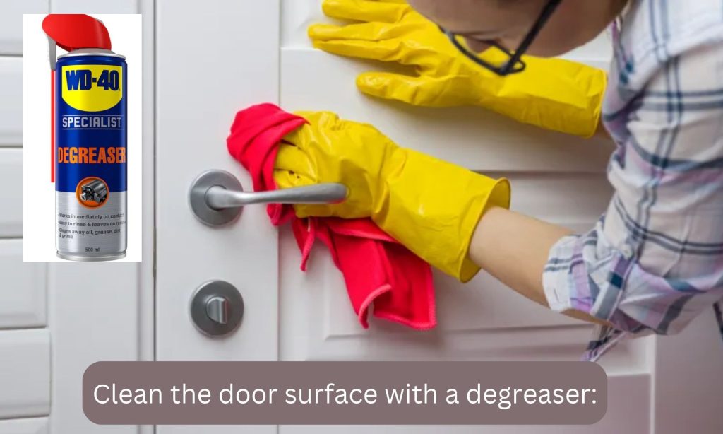Clean the door surface with a degreaser