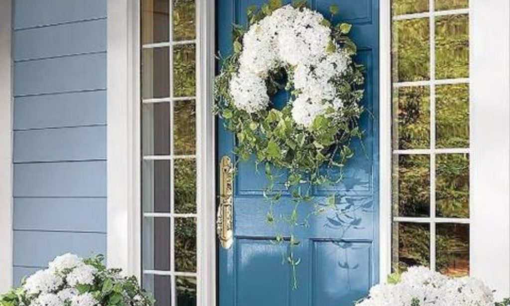 Place flowers on either side of your door: