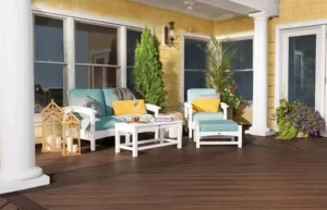 Yellow house with brown deck
