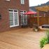 What Goes With a Red Brick House? Wood Decks in Different Colors!